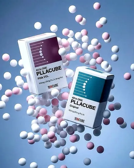 PLLACUBE Original and PLLACUBE PiNk VOL. boxes among white and pink microspheres